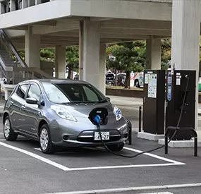 electric car chaging in car park